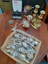 A quantity of silver plate to include cutlery, a tankard and teaspoons together with a pair of brass