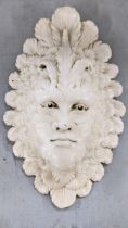 A composition wall hanging presence of Carnevale Greenman and mask sculpture Location: