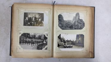An early 20th century postcard album containing mainly British postcards Location: