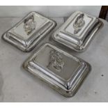 Three early 20th century silver plated entree dishes, two having gadrooned rims and one other