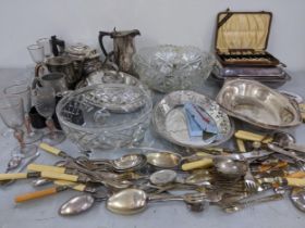 A mixed lot to include loose cutlery, entrée dish, glassware, silver plate and other items
