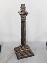 A vintage silver plated lamp in the form of a Corinthian column A/F Location: