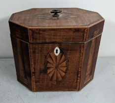 A Georgian Mahogany tea caddy of octagonal form and having marquetry inlaid Location: