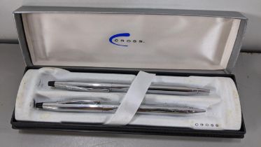 A Cross silver coloured ballpoint pen and pencil set, boxed Location: