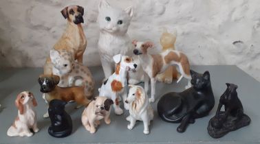 A quantity of ceramic and other models of animals to include a Royal Doulton Bulldog, a Russian