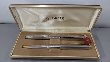 A Parker Sonnet Silver & Gold coloured fountain pen and pencil set, boxed, with 18k nib Location: