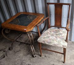 An Arts & Crafts oak chair together with a square topped coffee table on wrought iron legs Location: