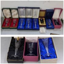 Eleven boxed collectable glasses to include Webb Corbett air twist, Royal Doulton silver jubilee