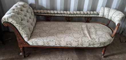 A late Victorian walnut carved reupholstered chaise longue, 76cm h x 184cm w Location: