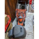 A Flymo Chevron 34C lawnmower with grass box Location: