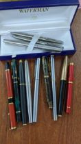A collection of 12 Parker and Waterman fountain pens, 9 fountain to include Parker 61, 65 and Vacu