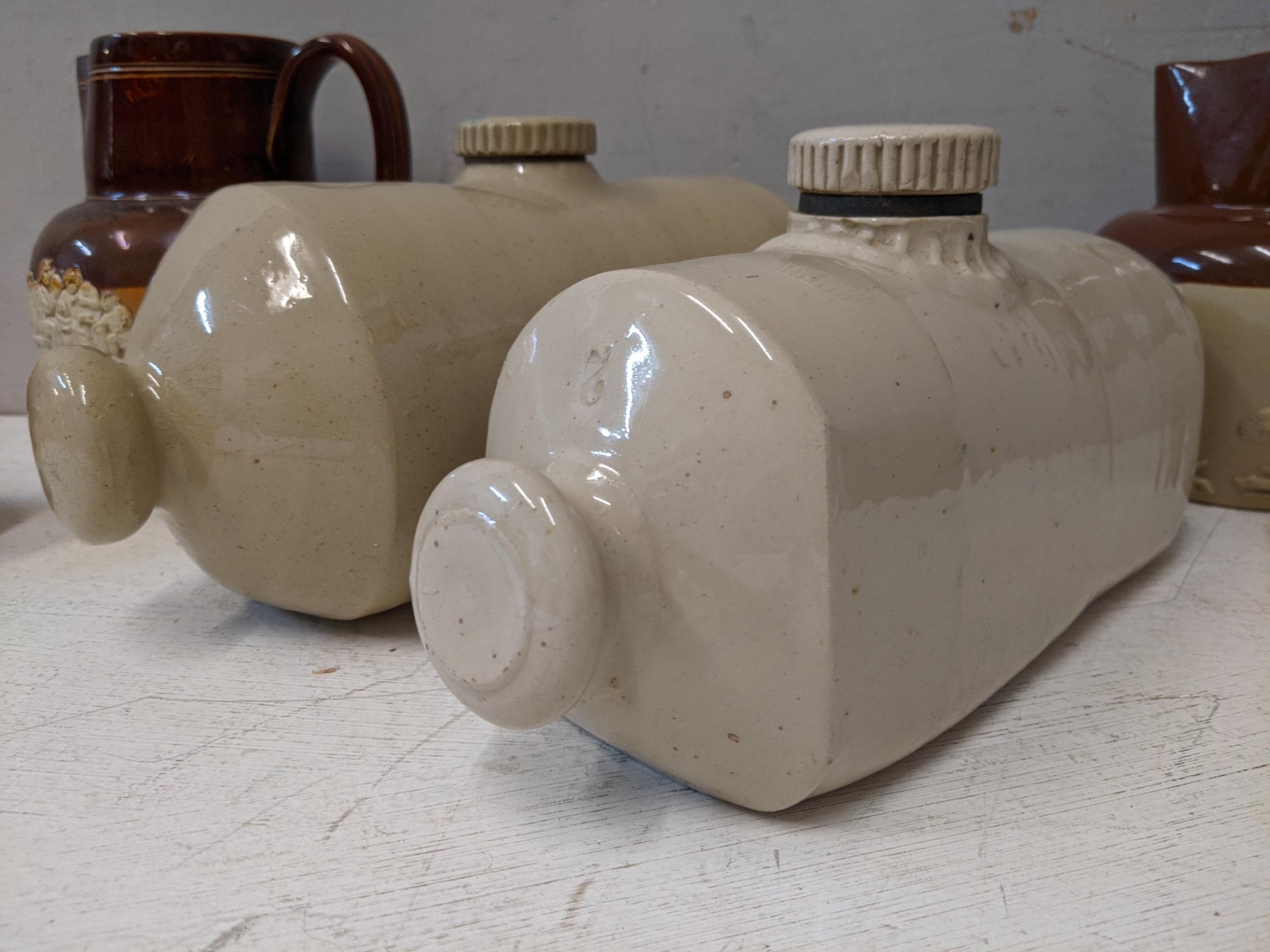 Three Doulton Lambeth jugs of various sizes and a pair on stone bed warmers and other household - Image 4 of 6