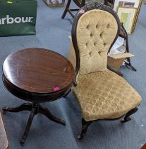 A Victorian mahogany spoon back nursing chair, together with a reproduction mahogany drum table