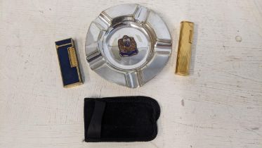 Two Dunhill cigarette lighters comprising a blue lapis lazuli lacquer example and the other gold
