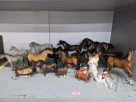 A group of Beswick horses, ponies, and a foal, along with a matt Beswick Pekinese in standing