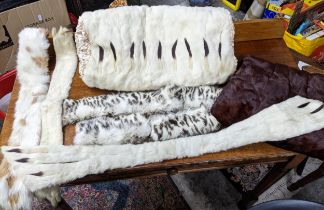 A Victorian ermine hand muff and matching ermine shoulder wrap, another fur hand muff, and other fur