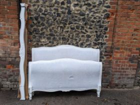 A white painted and upholstered double bed head and foot board with side rails, 150cm w Location: