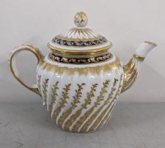 An 18th century Royal Worcester batchelor's teapot having gilt painted decoration, crescent mark