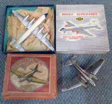 A vintage Silver Streak clockwork model of an aircraft nO:20215 in original box together with a