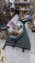 A Life Cycle 9100 exercise bike Location: