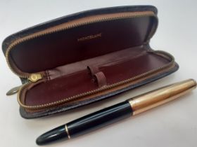 Montblanc-A black Meisterstuck 4810 fountain pen having a gold tone lid engraved with the design