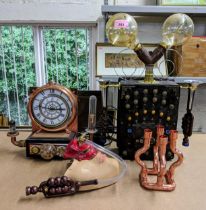 Steampunk related items to include a clock, a mask, a lamp and a four-branch copper effect