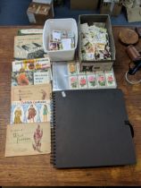 Cigarette cards and tea card books and loose cards and in plastic wallets with French game cards