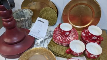 Christmas related items to include Hausenware, cups, saucers, plates, place mats, a lamp fashioned