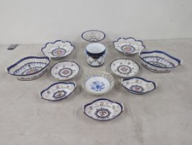 A collection of Dela Reine hand painted ceramics to include twin handles baskets, a centre piece and