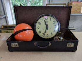 A leather bound case, along with a reproduction electric Smiths clock and an orange circular retro