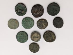 Ancient Greece - A group of eleven mixed coins to include helmeted head of Athena in crested