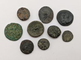Ancient Greece - A group of nine bronze coins to include, Helmeted head of Athena in crested