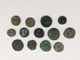 Ancient Greece - A group of thirteen mixed coins to include Bronze Sicily with head of Herakles in