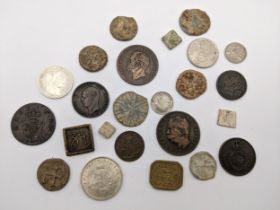 A group of mixed coins and tokens to include George III 1781 Irish Halfpenny, George IV Farthing,