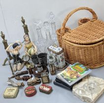 A mixed lot to include a small carriage clock, A/F, three decanters, DVD's brass candlesticks,