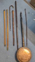 A mixed lot to include silver top walking sticks, a fold out tri pod walking stick A/F, child's