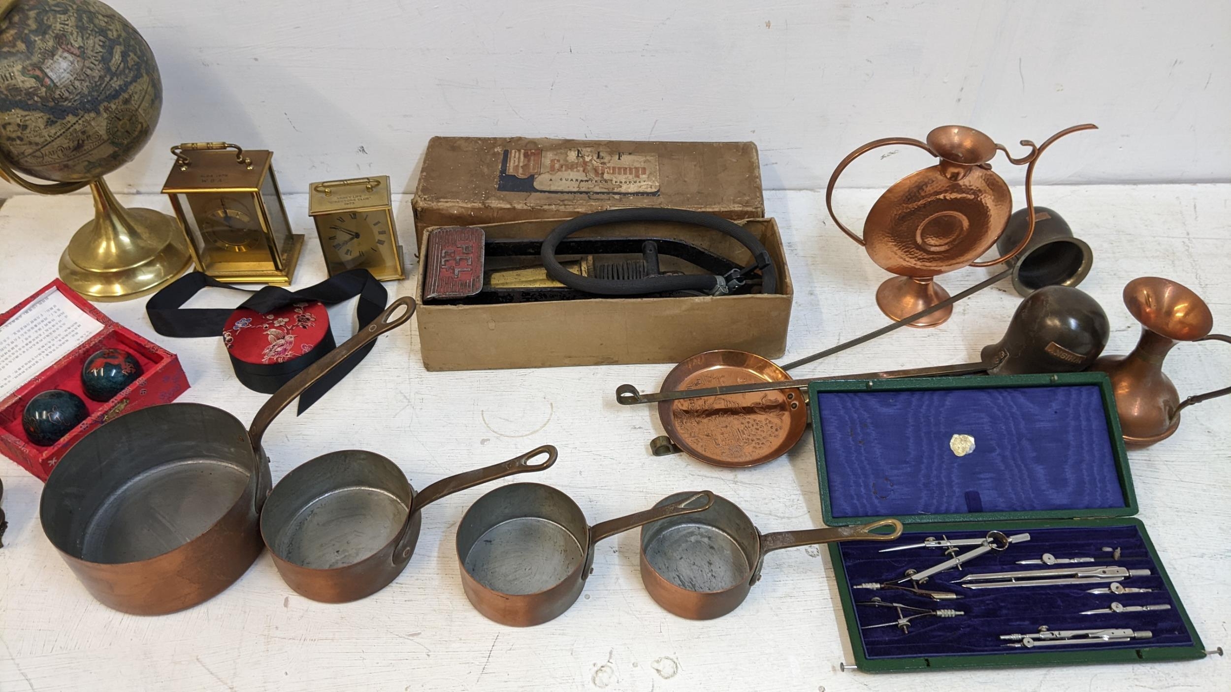 Collectables to include an ELF vintage car foot pump, copper pans, drawing instruments, clocks and
