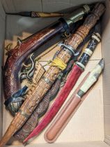 Mixed collectables to include a decorative wall hanging flintlock pistol, decorative edged weapons