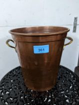 A copper and brass twin handled brass wine cooler Location: G