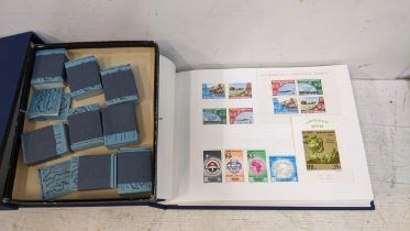 An album of mint Union Postal Universelle postage stamps and books of mint Jersey stamps, Location:G