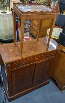 A late 20th century yew finished inlaid cabinet with a drawer and twin doors, together with a