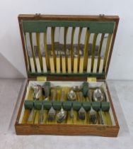 A canteen of cutlery for six in an oak finished case. Pens-Parker 45s and Harlequin to include