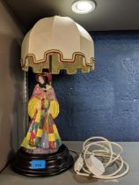 An early/mid 20th century Royal Doulton lamp 'The Parsons Daughter' HN564 designed by Harry