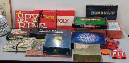 A group of board games to include Monopoly, Pictionary, Who want to be a Millionaire and others