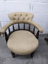 A Victorian mahogany framed Captains desk chair with a spindle back, on turned legs Location: G