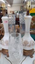 Two large cut glass vases and another together with a pair of milk glass vase shaped table lamps