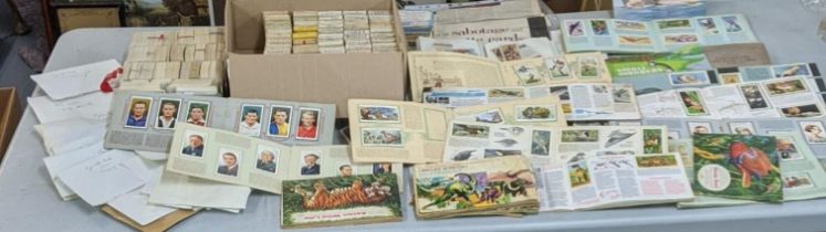 A quantity of cigarette cards to include 'Players Medium Navy Cut' and others along with cigarette