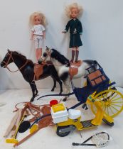 Two 1980's 2nd Generation dolls stamped 2 GEN 033055X to the rear of the neck wearing clothing and