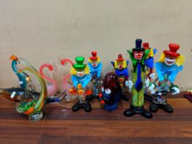 A collection of art glass to include a group of six Murano clowns (highest 30cm), two flamingos, a