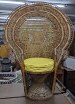 A mid 20th century wicker peacock armchair Location:G